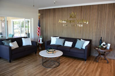 Cozy lobby area with comfortable seating and decor