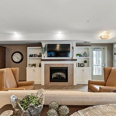 Cozy common area with seating and a fireplace