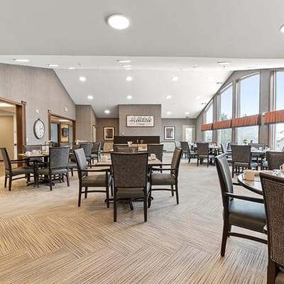 Bright dining room with tables and chairs