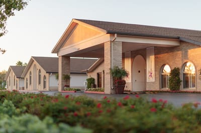 Exterior view of the Arlington Gardens Care Center building