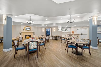 Bright dining room with tables set for meals
