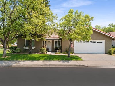 Exterior view of a residential-style facility with trees