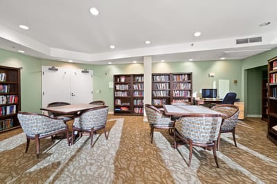 Common area with bookshelves and seating