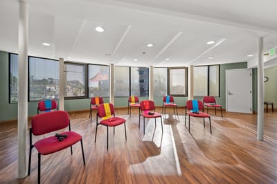 Activity room with chairs set up for a group session