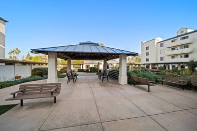 Outdoor seating area with gazebo and garden