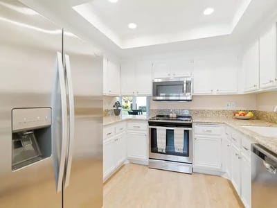 Bright modern kitchen with stainless steel appliances