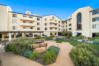 Exterior view of Westmont of Escondido with landscaped courtyard