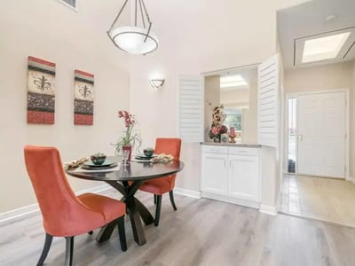 Bright dining area with a table and chairs