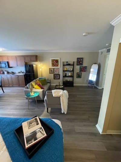 Living room area with modern furnishings and artwork