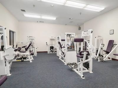 Interior view of a gym with exercise equipment