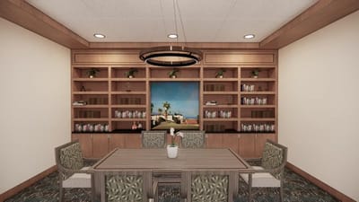 Interior common area with a dining table and bookshelves