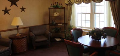 Interior of a cozy common area with seating