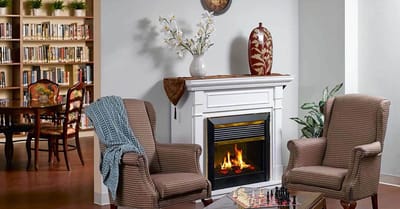 Comfortable common area with seating and bookshelf
