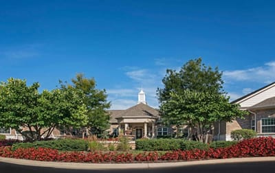 Exterior view of the Autumn Leaves facility surrounded by greenery