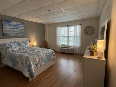 Cozy private bedroom with a view and decor