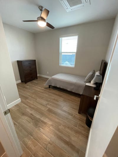 Private resident room with a bed and furniture