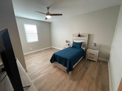 Private resident room with a bed and furniture