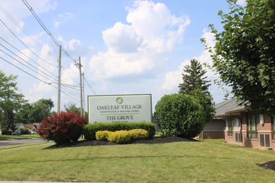 Exterior view of The Grove at Oakleaf Village sign