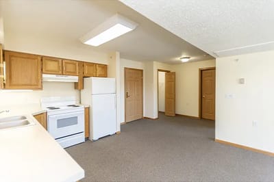 Bright, spacious kitchen area in a resident's room