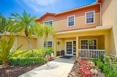 Front entrance of a senior living facility with landscaping