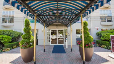 Entrance of Ida Culver House Ravenna with landscaped planters