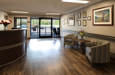 Bright interior lobby with seating and artwork