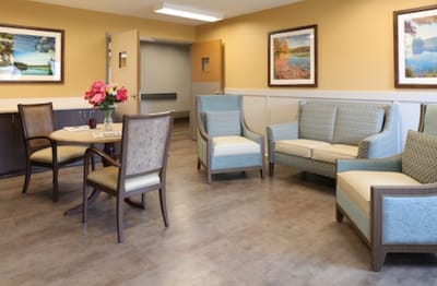 Comfortable seating area with artwork in a common space