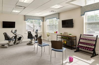 Interior view of a fitness area with exercise equipment
