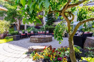 Beautiful outdoor courtyard with seating and flowers