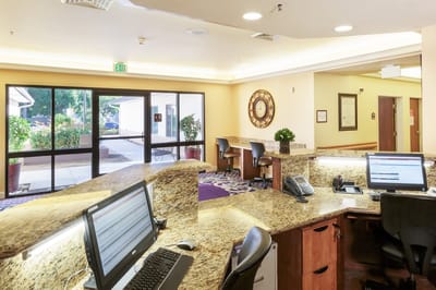 Reception area with seating and computers