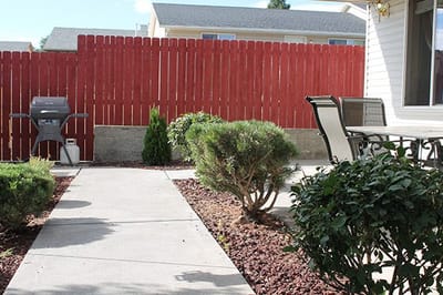 Pathway in a landscaped outdoor area with seating