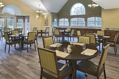Dining area with tables and chairs arranged