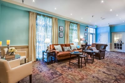 Cozy common area with comfortable seating and natural light