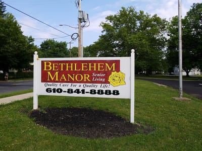 Sign for Bethlehem Manor with contact information