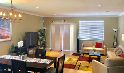 Interior view of the common area with seating and dining table