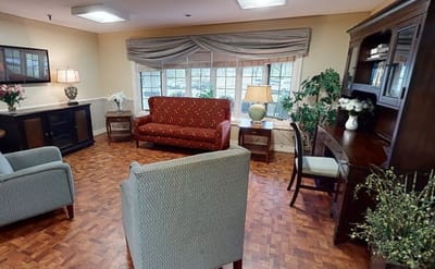 Cozy common area with seating and natural light