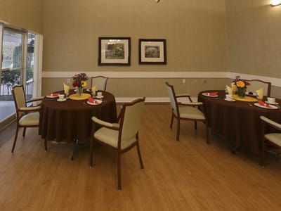 Dining area with tables set for meals
