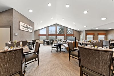 Bright dining area with tables and chairs