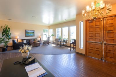 Bright and welcoming lobby area with seating and decor