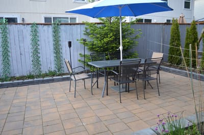 Outdoor patio area with table and chairs
