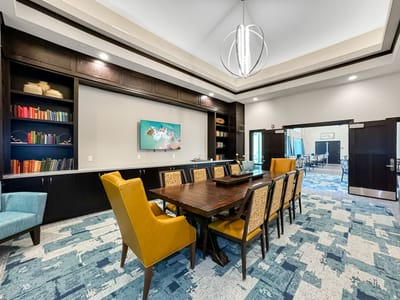 Interior view of a common area with a dining table