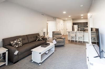 Cozy interior of a resident's living room with furniture