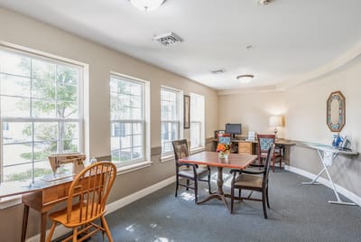 Bright common area with tables and chairs