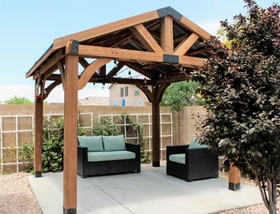 Outdoor seating area with a gazebo and landscape