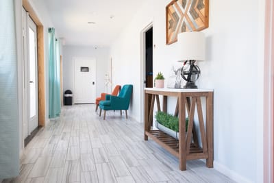 Bright and inviting interior hallway with seating