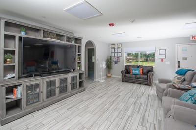 Common area with a TV and seating
