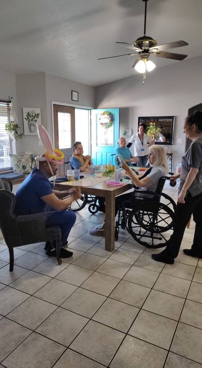 Residents participating in a group activity in a common area