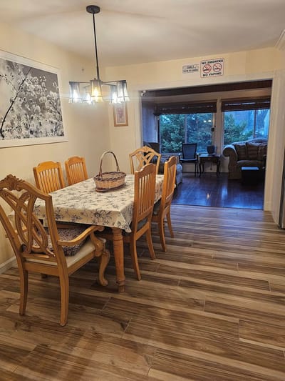 Bright dining area with wooden dining table and chairs