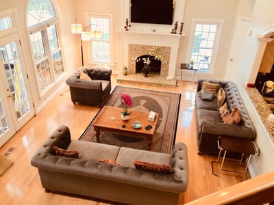 Bright common area with sofas and a coffee table