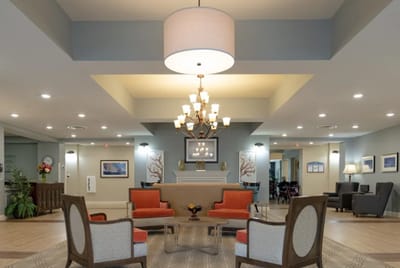 Interior view of a cozy common area with seating